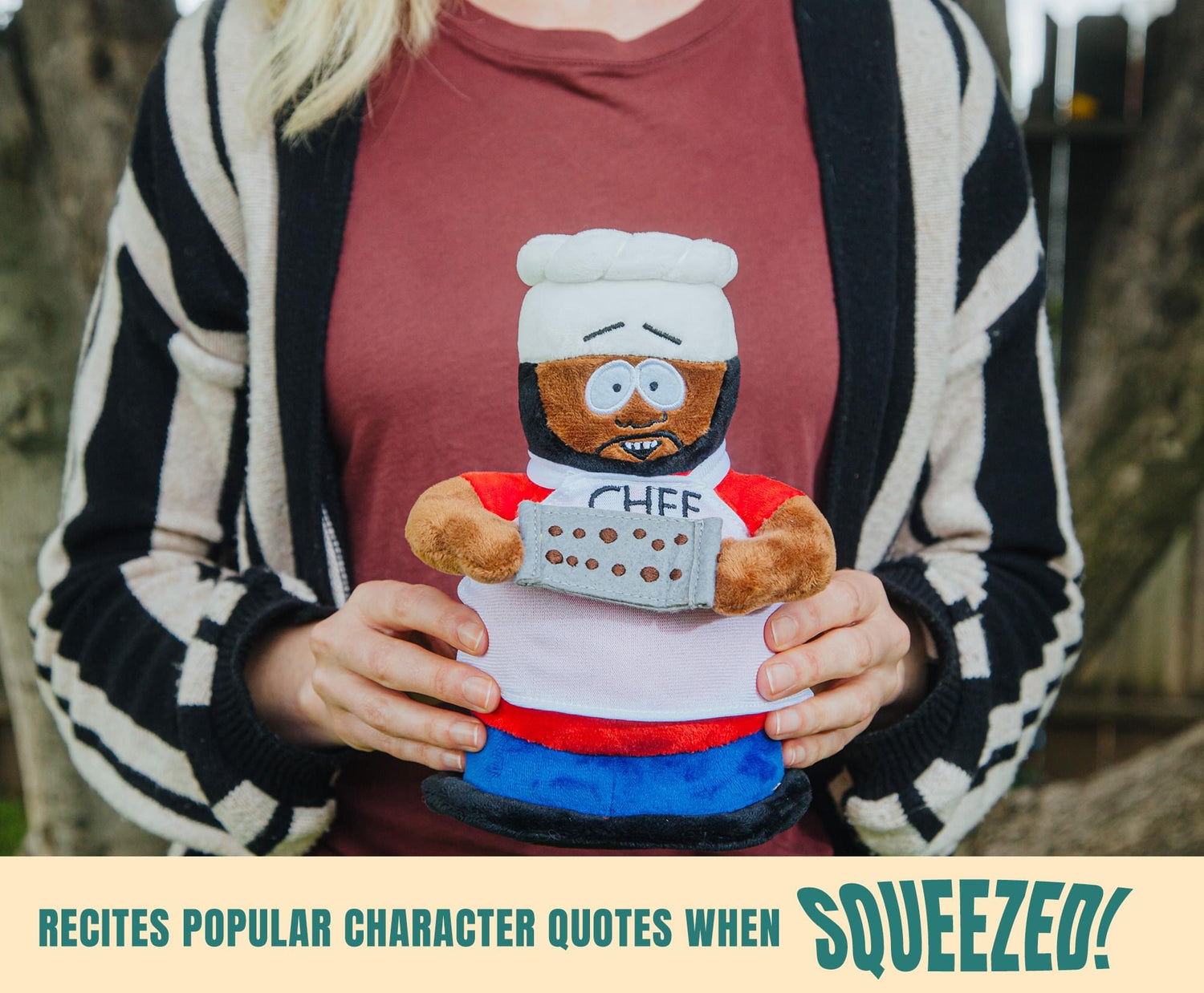 South Park Chef plush toy posed sitting down on a flat surface