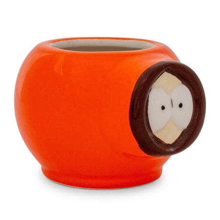 Side profile of the sculpted Kenny mug showing the handle and rounded ceramic body