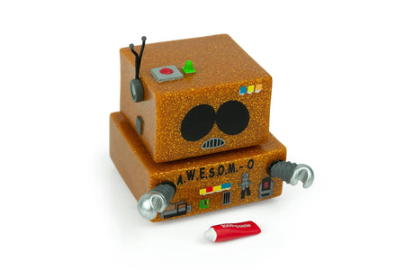 Front view of the AWESOM-O figure featuring sparkling glitter finish on the cardboard box design
