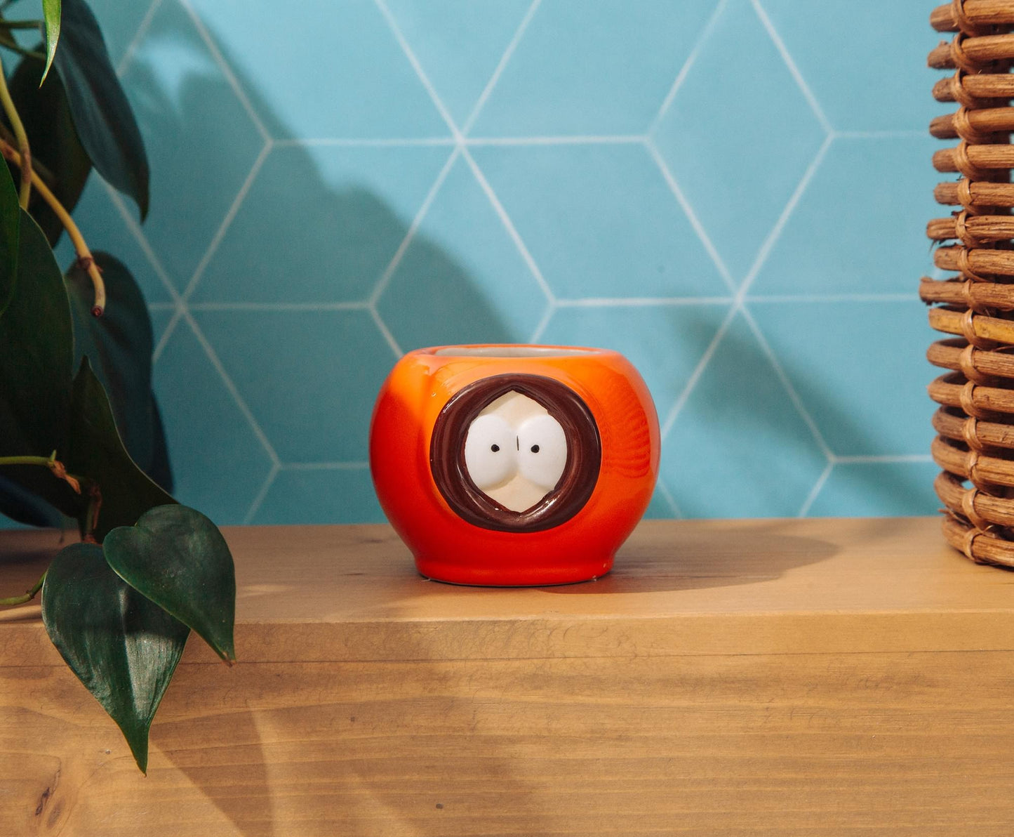 Close-up of the Kenny character details on the sculpted mini mug
