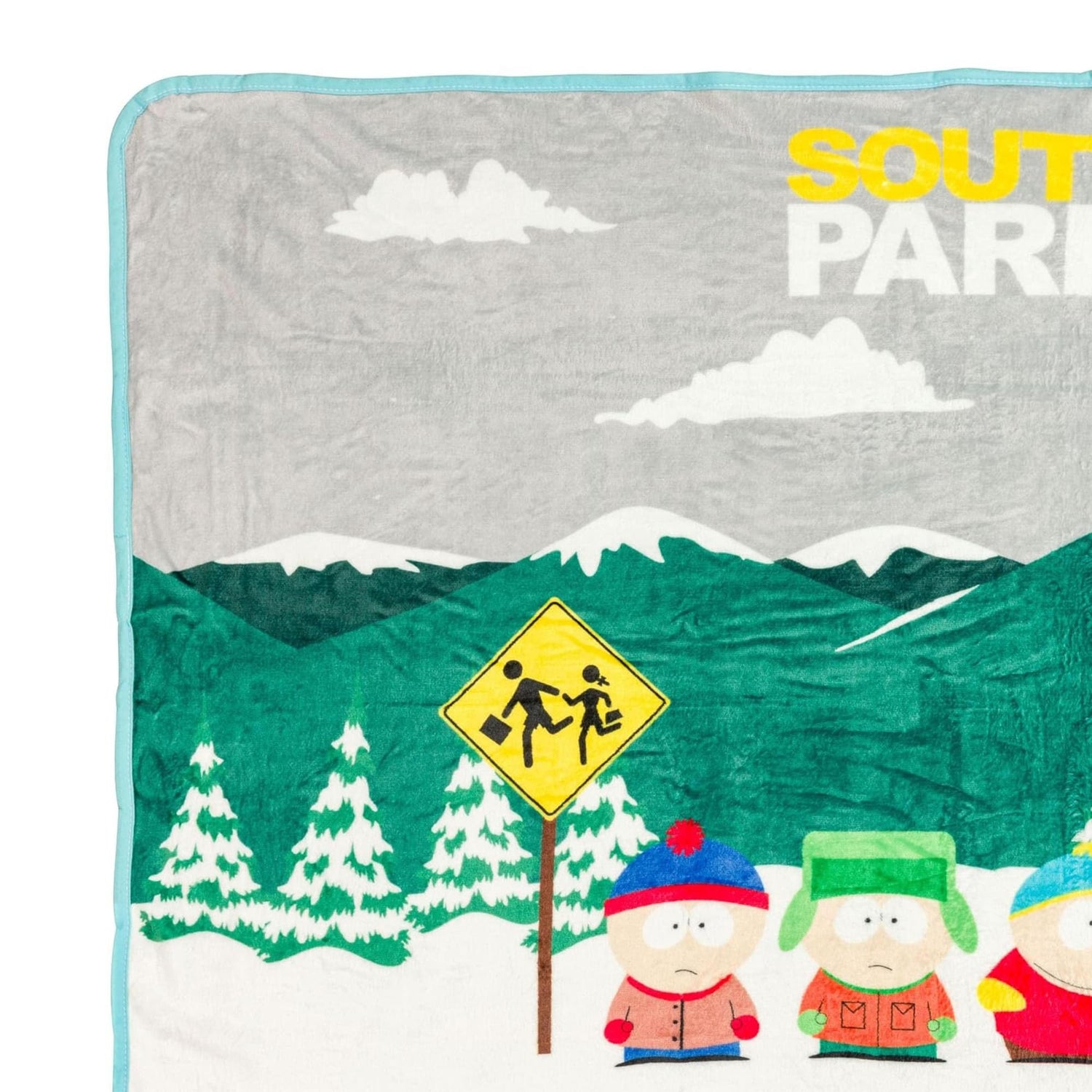Close-up of the South Park characters printed on the fleece throw blanket