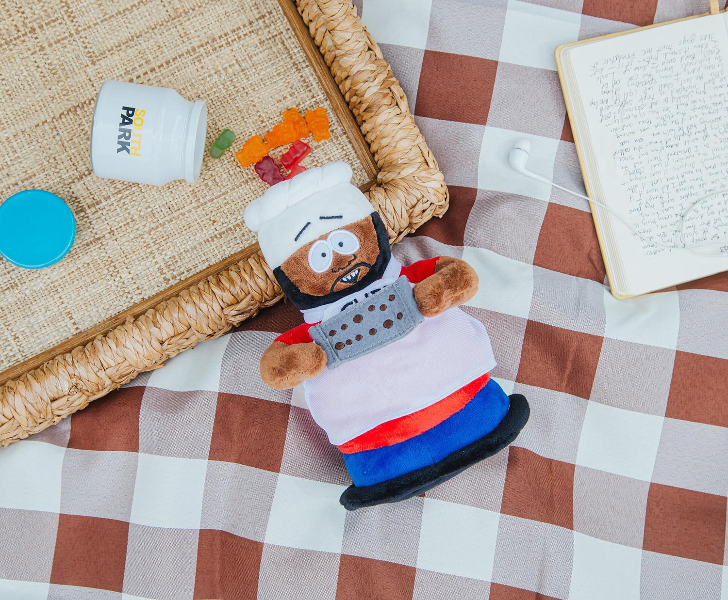 Detailed view of the small pan accessory held by the Chef plush